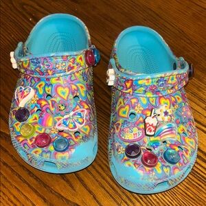 CROCS Kids Multicolor Heart and Butterfly Clogs; worn on bottom